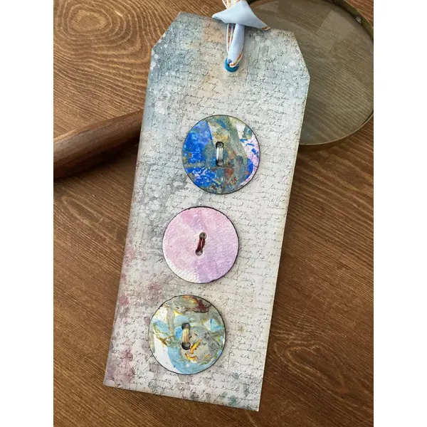 Boutons en papier peints à la main