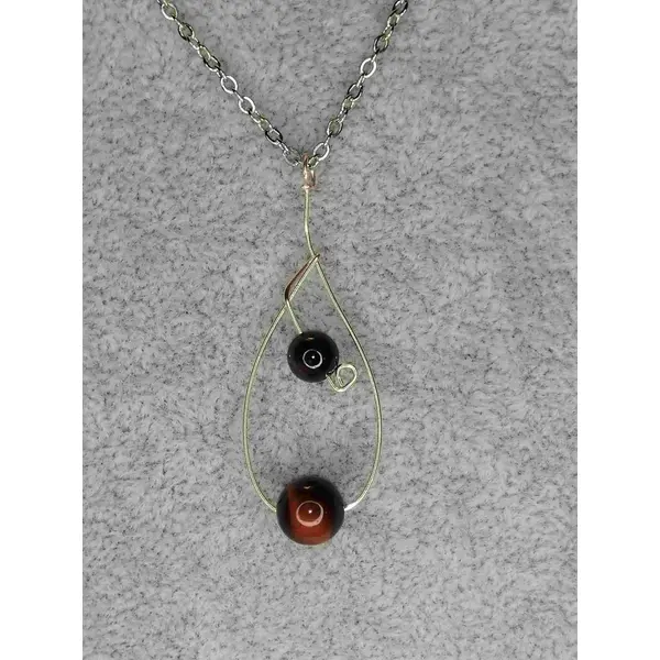Collier mi-long et pierres de quartz ou oeil de taureau