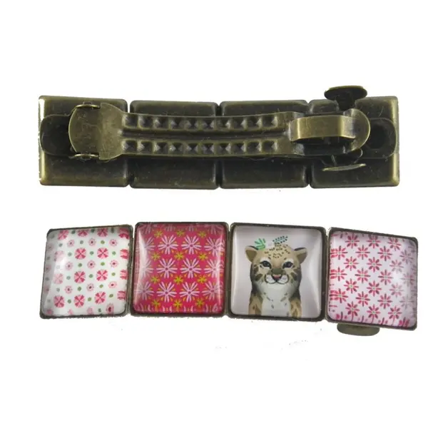 Barrette bronze lynx et cabochons carrés roses