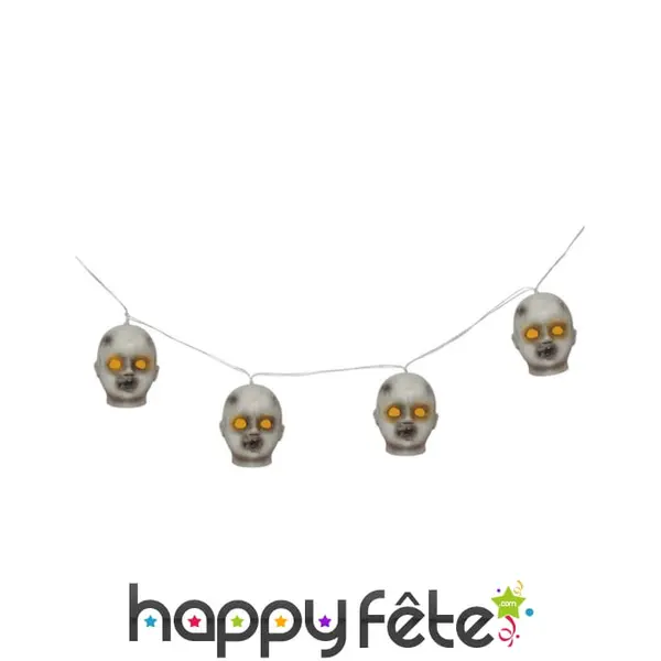 Guirlande têtes de poupées lumineuses