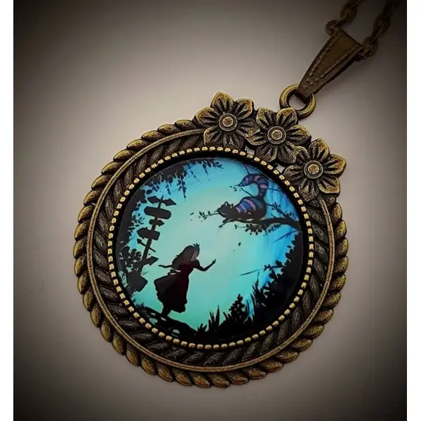 Pendentif rond " we are all mad" - cabochon illustré pays des merveilles - hommage lexis carroll