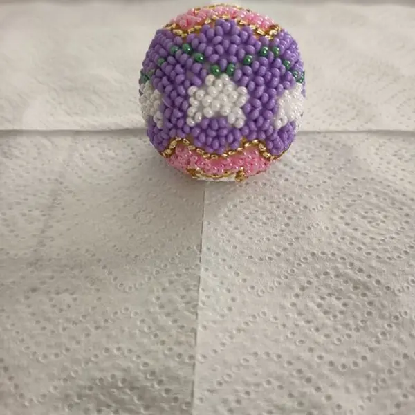 Explication pour realiser une boule en tissage danois