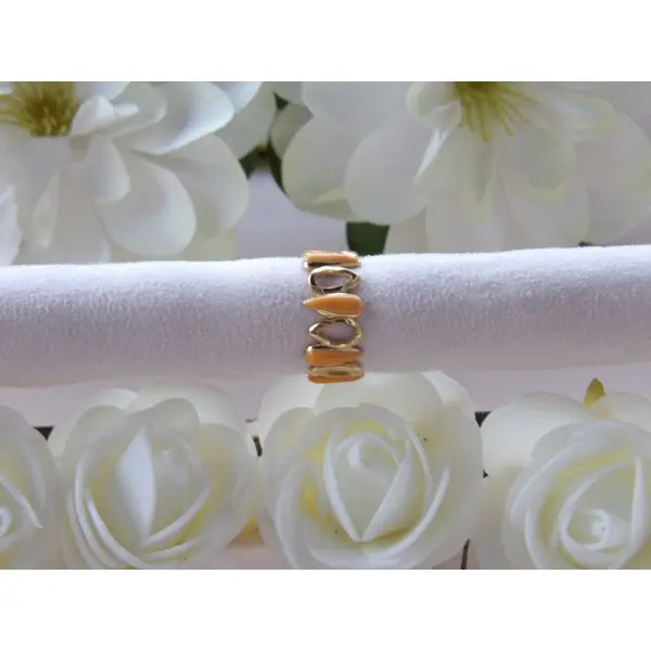 Bague or en forme de gouttes colorées
