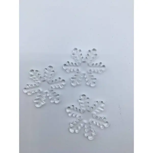 12 Flocons en plastique transparents