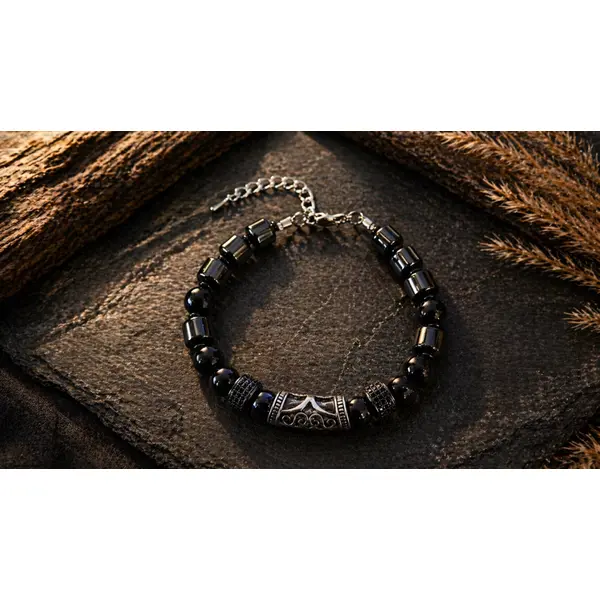 Bracelet ajustable masculin homme aventurier chic perle noire ronde forme tonneau pierre hématite naturelle perle centrale gravée