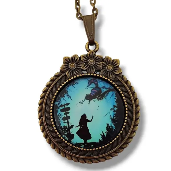 Pendentif rond " we are all mad" - cabochon illustré pays des merveilles - hommage lexis carroll