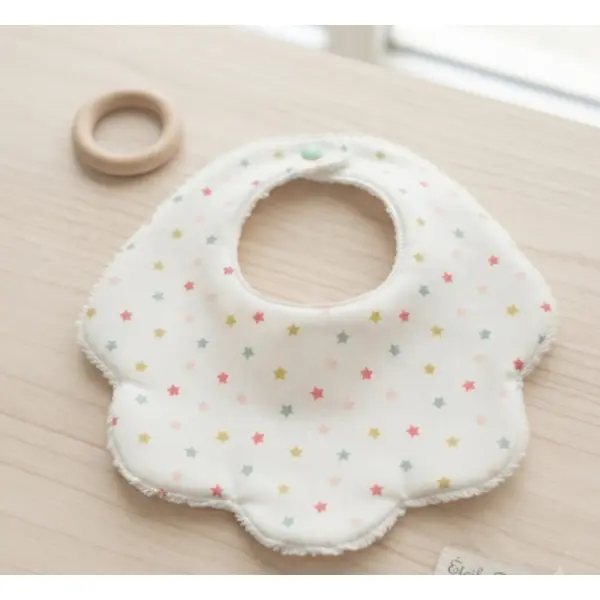 S​uperbe bavoir fleur en coton étoilé