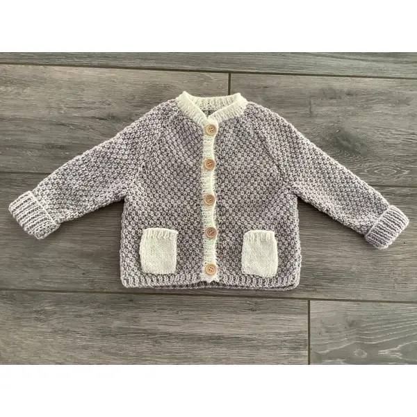 Gilet en taille 1 an. pour bébé fille.