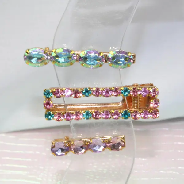 Trio de barrettes à strass – l’art de l’accumulation étincelante