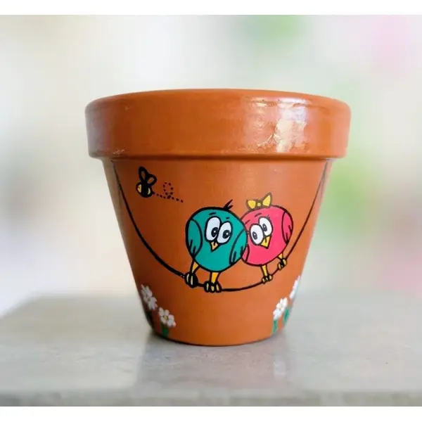 Pot en terre cuite illustration fait-main famille oiseaux