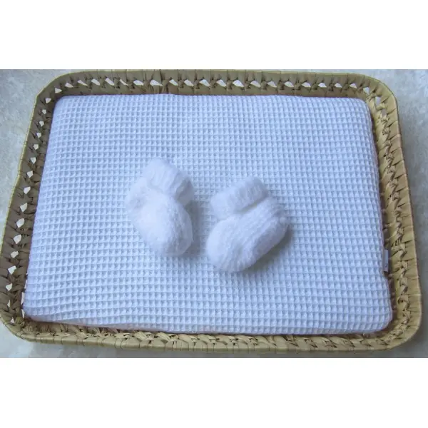 Chaussons naissance coloris blanc