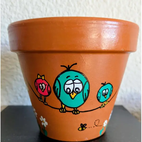 Pot en terre cuite illustration fait-main famille oiseaux
