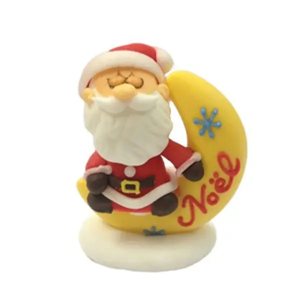 24 décors comestibles Père Noël sur la lune