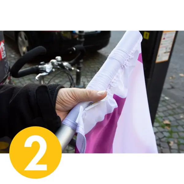 Porte-drapeau pour lampadaire