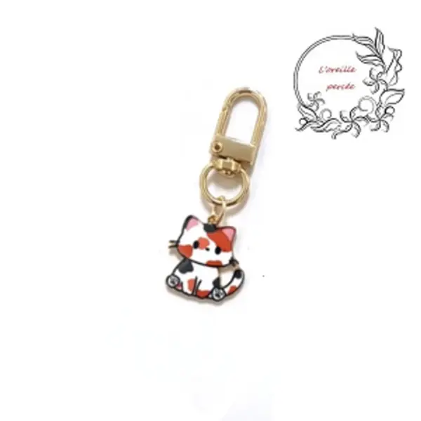 Porte clé chat tacheté émail