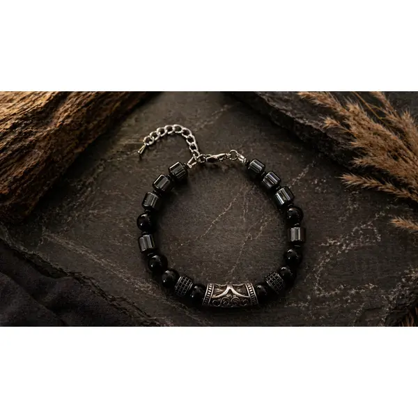 Bracelet ajustable masculin homme aventurier chic perle noire ronde forme tonneau pierre hématite naturelle perle centrale gravée