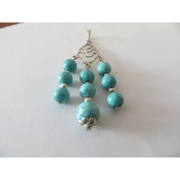 Pendentif véritable turquoise et argent 925 .
