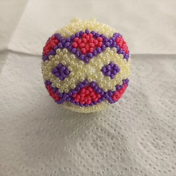 Explication pour realiser une boule en tissage danois