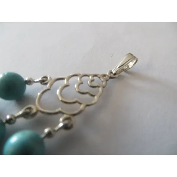 Pendentif véritable turquoise et argent 925 .