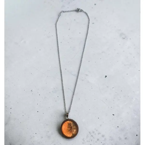 Collier médaillon nébuleuse marron