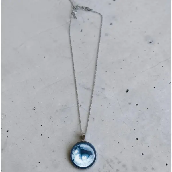 Collier médaillon nébuleuse bleu