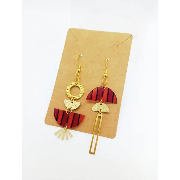 Boucles d'oreilles pendantes asymétriques