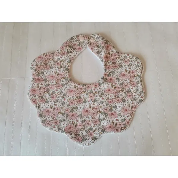 Bavoir naissance fleur coton imprimé et éponge