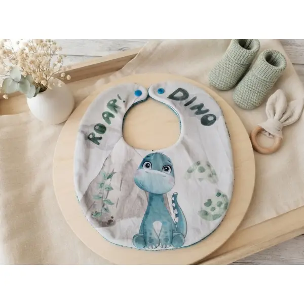 Bavoir bébé coton imprimé dinosaure et éponge turquoise