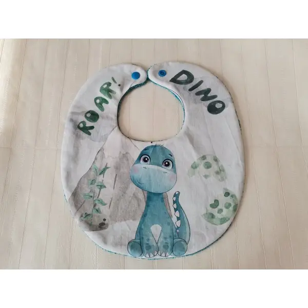 Bavoir bébé coton imprimé dinosaure et éponge turquoise
