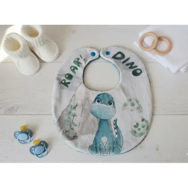 Bavoir bébé coton imprimé dinosaure et éponge turquoise