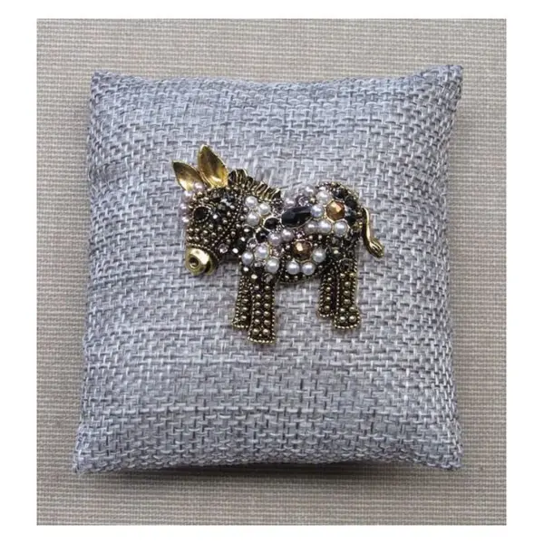 Broche bijou épingle petit cheval ou âne acier couleur bronze et perles.