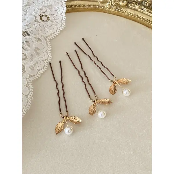 Pics cheveux mariée feuilles de perle dorées – accessoire coiffure mariage élégant