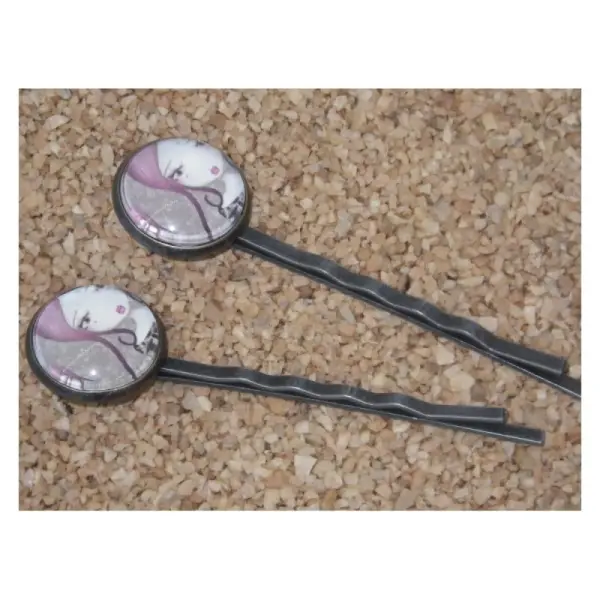 Lot de 2 barrettes en métal couleur bronze et cabochon petite fille rose