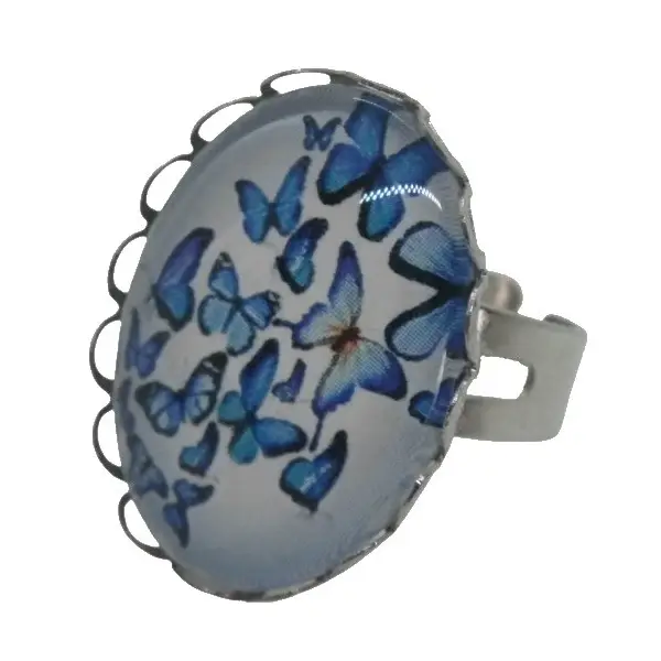 Bague argentée motif papillons bleus