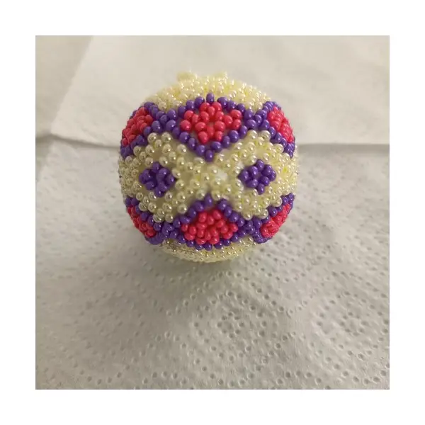 Explication pour realiser une boule en tissage danois