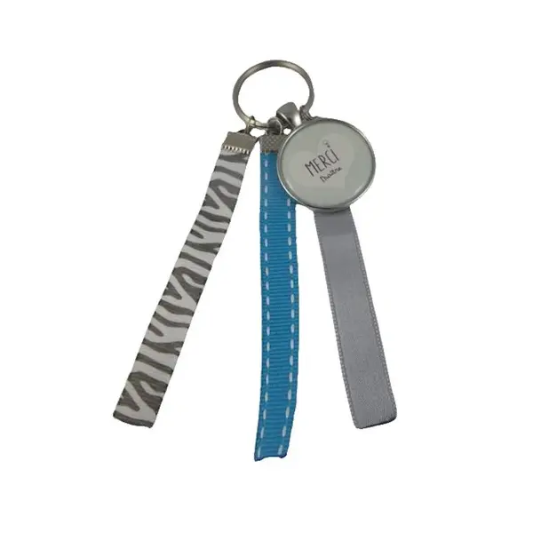 Porte clés bleu et gris "merci maître"