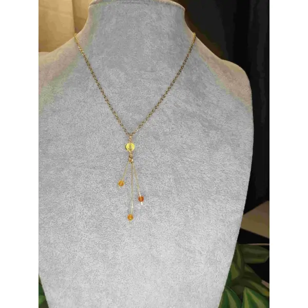 Collier mi-long en ambre naturelle