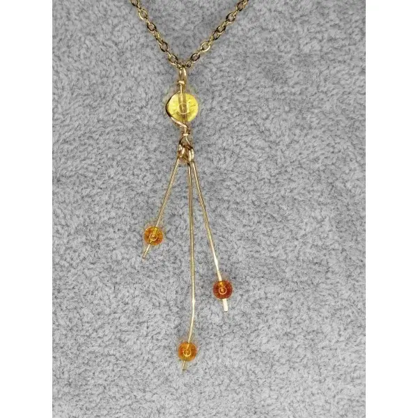 Collier mi-long en ambre naturelle