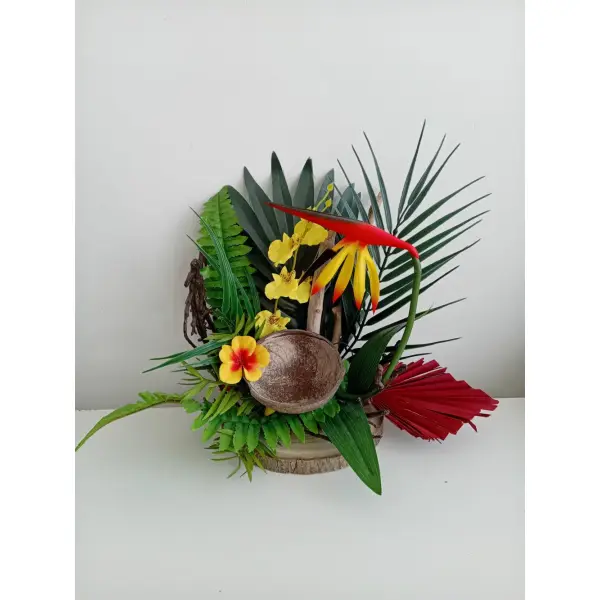 Bouquet floral exotique sur grand rondin de bois - centre de table