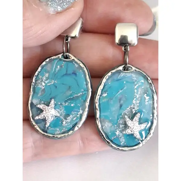 Boucles d'oreilles pendantes "étoile des lagons"