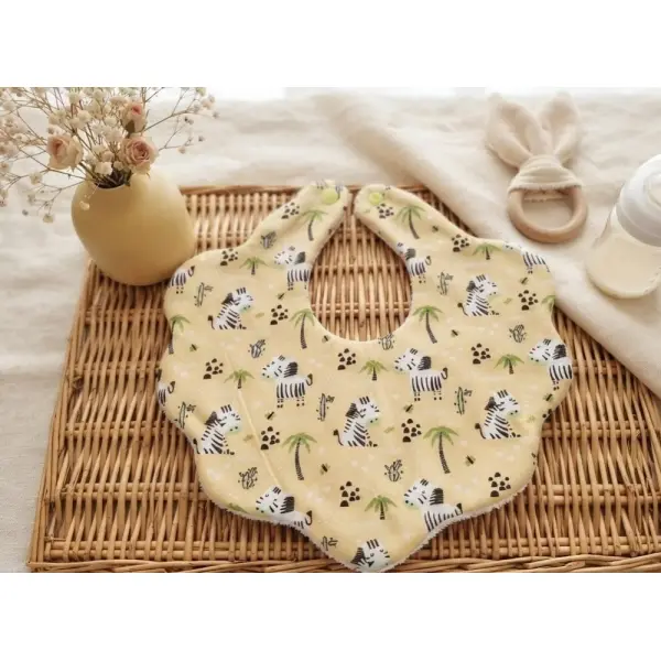 Bavoir naissance fleur coton imprimé et éponge